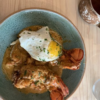 Bearcat CBD - Biscuits with Cajun gravy and lobster topped with egg. - Coffee & Tea Near Me - New Orleans, Louisiana Bearcat CBD - Biscuits with Cajun gravy and lobster topped with egg. - Coffee & Tea Near Me - New Orleans, Louisiana