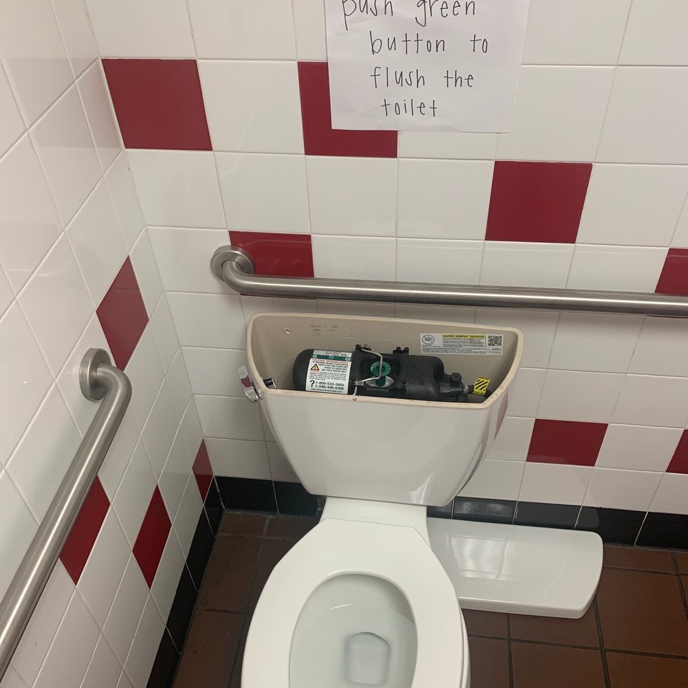 Sign asking to flush toilet from the tank Sign asking to flush toilet from the tank