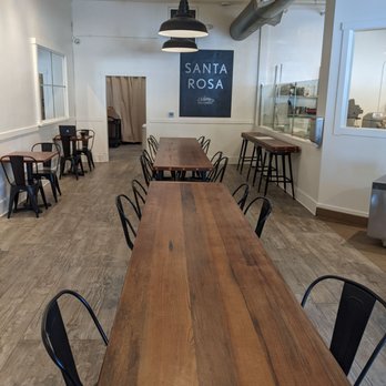 Johnny Doughnuts - a dining room with tables and chairs - Donuts Near Me - Santa Rosa, California
