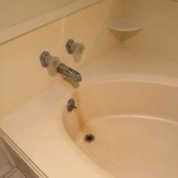 BRIM Properties - Stained tub which can be removed with proper cleaning chemicals. - Property Management Near Me - Holladay, Utah