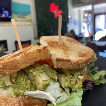 One Love Cafe - Chicken Almond Pesto Sandwich - Coffee & Tea Near Me - San Bruno, California One Love Cafe - Chicken Almond Pesto Sandwich - Coffee & Tea Near Me - San Bruno, California