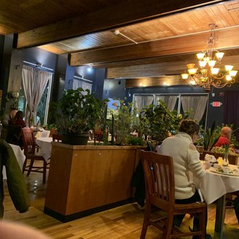Nataz Restaurant - people sitting at tables in a restaurant - Seafood Near Me - North Branford, Connecticut