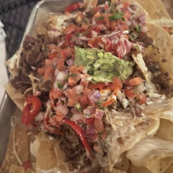 Piggy's Kitchen & Bar - Brisket Nachos - Breakfast & Brunch Near Me - Houston, Texas Piggy's Kitchen & Bar - Brisket Nachos - Breakfast & Brunch Near Me - Houston, Texas
