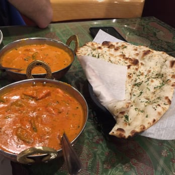 Royal India - mild, hot chicken tikka masalas and garlic naan. the darker the curry the spicier, apparently? hot had more flavor in general, though. - Indian Near Me - Sandy, Utah Royal India - mild, hot chicken tikka masalas and garlic naan. the darker the curry the spicier, apparently? hot had more flavor in general, though. - Indian Near Me - Sandy, Utah