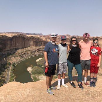 Moab Adventure Center - Family photo in front of the Colorado River - Rafting/Kayaking Near Me - Moab, Utah Moab Adventure Center - Family photo in front of the Colorado River - Rafting/Kayaking Near Me - Moab, Utah