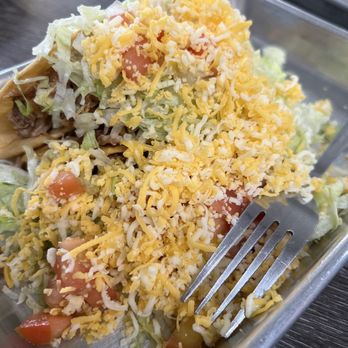 Chicho's - a plate of food with a fork - Mexican Near Me - San Luis Obispo, California Chicho's - a plate of food with a fork - Mexican Near Me - San Luis Obispo, California