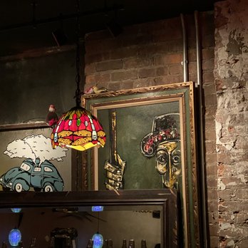 Myrtle Pub - a picture of a bar with a painting on the wall - Bars Near Me - Queens, New York Myrtle Pub - a picture of a bar with a painting on the wall - Bars Near Me - Queens, New York
