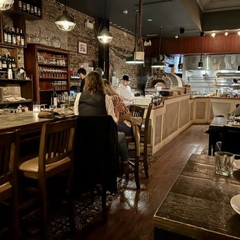 The Good Son - people sitting at the bar - Pizza Near Me - Toronto, Ontario The Good Son - people sitting at the bar - Pizza Near Me - Toronto, Ontario