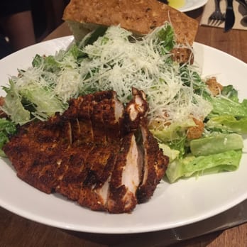 Earls Kitchen + Bar - Cajun chicken Cesar salad with focaccia - Canadian (New) Near Me - Richmond, British Columbia Earls Kitchen + Bar - Cajun chicken Cesar salad with focaccia - Canadian (New) Near Me - Richmond, British Columbia
