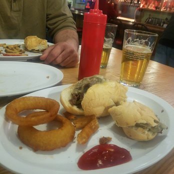 Lake Inn - a man sitting at a table with a plate of food - Bars Near Me - Ebensburg, Pennsylvania Lake Inn - a man sitting at a table with a plate of food - Bars Near Me - Ebensburg, Pennsylvania