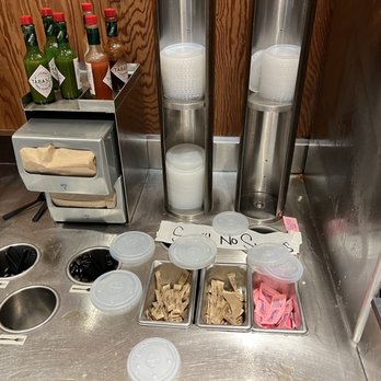Chipotle Mexican Grill - Handmade sign under the clutter, "Sorry no straws" - Mexican Near Me - Fort Myers, Florida