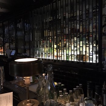 Denson Liquor Bar - Cool bar wall decor - Cocktail Bars Near Me - Washington, DC, District of Columbia