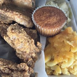 Tippy’s - Fried Ribs Macaroni and Cheese Cabbage  Pigeon Peas and Rice  And Strawberry Crunch