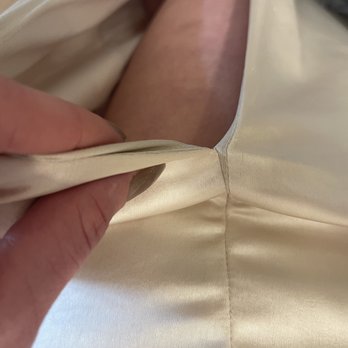 Tina's Alterations - Over a millimeter off on alignment of their hem to the original - Sewing & Alterations Near Me - Charlotte, North Carolina Tina's Alterations - Over a millimeter off on alignment of their hem to the original - Sewing & Alterations Near Me - Charlotte, North Carolina