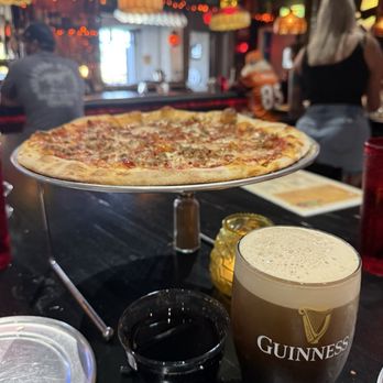 Johnny’s Garage - House red wine glass $9 and perfect Guinness Pint with Holy Hog - New American Near Me - Hanahan, South Carolina Johnny’s Garage - House red wine glass $9 and perfect Guinness Pint with Holy Hog - New American Near Me - Hanahan, South Carolina