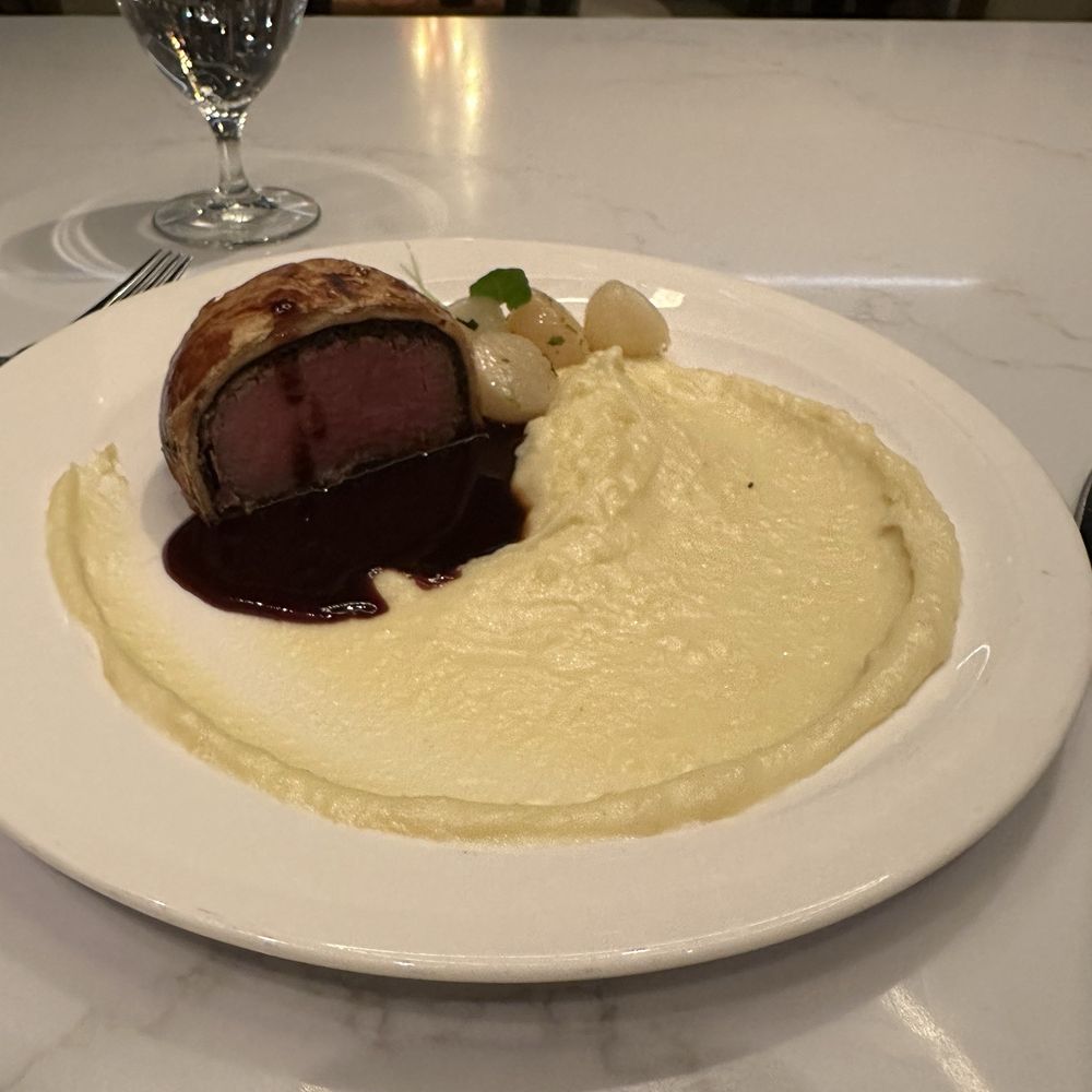 Ramsay's Kitchen - Beef Wellington (half pictured bc they split into 2 plates for us) - New American Near Me - Las Vegas, Nevada