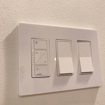 Mardigras Electric - The switches for various lights in the home including the chandelier that was installed. A dimmer was for the glass chandelier. - Electricians Near Me