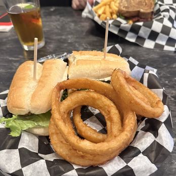 Fisher's Cafe & Pub - Fish Sandwich with Onion Rings - Pubs Near Me - Peninsula, Ohio Fisher's Cafe & Pub - Fish Sandwich with Onion Rings - Pubs Near Me - Peninsula, Ohio