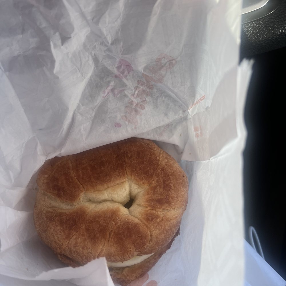  a bagel with a bite taken out of it