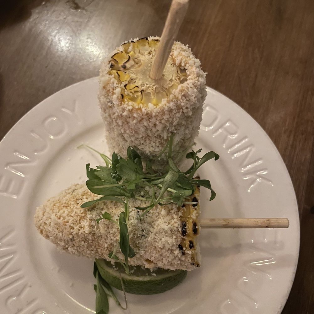 Hermanas Kitchen and Cocktails - Elote (Corn on the cob w cheese, cream, and spices) - Cocktail Bars Near Me - Lindenhurst, New York Hermanas Kitchen and Cocktails - Elote (Corn on the cob w cheese, cream, and spices) - Cocktail Bars Near Me - Lindenhurst, New York