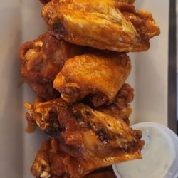 Next Level Sports Lounge - Nice crispy wings come by the weight this had 9 wings. Very good wings