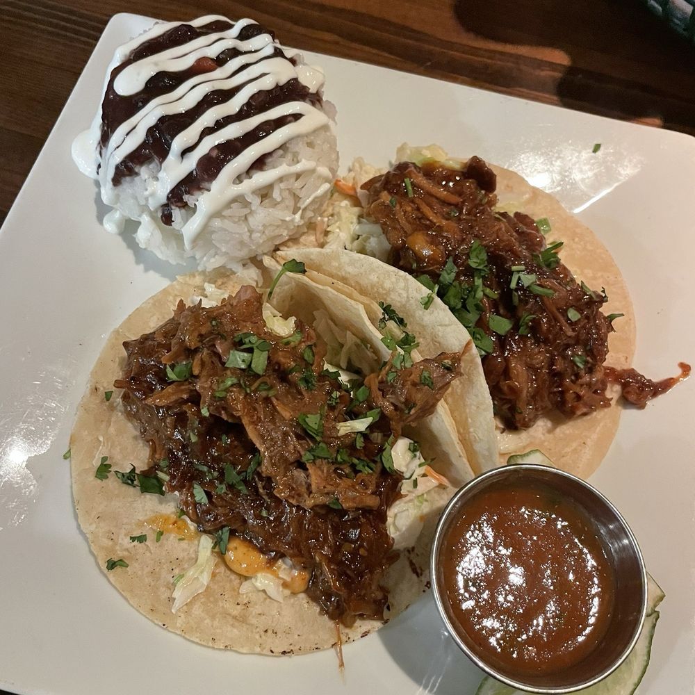 Hula's Modern Tiki - Pork tacos. Plated beautifully, but too sweet :( - Hawaiian Near Me - Phoenix, Arizona Hula's Modern Tiki - Pork tacos. Plated beautifully, but too sweet :( - Hawaiian Near Me - Phoenix, Arizona