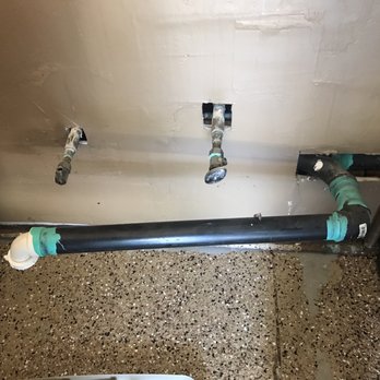 Bravo Water Heaters And Plumbing - Before: hot water, cold water & drain pipe. - Plumbing Near Me