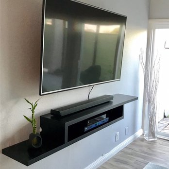 One & Done Handyman - Floating wall mounted tv console nice and level and sturdy on studs! - Handyman Near Me One & Done Handyman - Floating wall mounted tv console nice and level and sturdy on studs! - Handyman Near Me