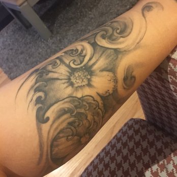 The Crows Den - Art and Tattoos - Flower in waves calf - Tattoo Near Me - San Francisco, California The Crows Den - Art and Tattoos - Flower in waves calf - Tattoo Near Me - San Francisco, California