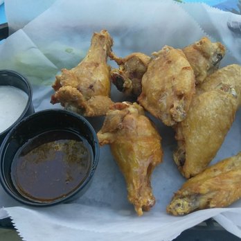 Caribbean Jack's - Slightly overcooked wings. Good flavor though. - Caribbean Near Me - Daytona Beach, Florida Caribbean Jack's - Slightly overcooked wings. Good flavor though. - Caribbean Near Me - Daytona Beach, Florida
