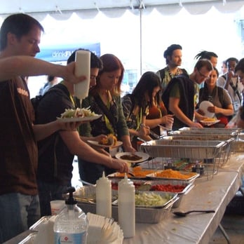 NuclearTacos - a group of people serving themselves - Tacos Near Me NuclearTacos - a group of people serving themselves - Tacos Near Me