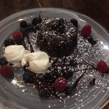 Ti 22 - Chocolate lava cake with fresh fruit - Thai Near Me - Seattle, Washington Ti 22 - Chocolate lava cake with fresh fruit - Thai Near Me - Seattle, Washington