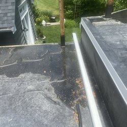 Danny Cerqueira's Construction - Not waiting for the adhesive to cure before applying rubber roof, resulting in excessive bubbling