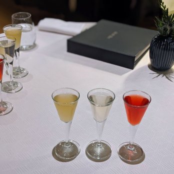 Aquavit - Flight of 3 aquavits, left to right: toasted rye, horseradish, lingonberry - Scandinavian Near Me - New York, New York Aquavit - Flight of 3 aquavits, left to right: toasted rye, horseradish, lingonberry - Scandinavian Near Me - New York, New York