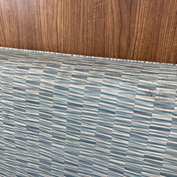 Pollo Tropical - a closeup of a blue and white woven upholstered headboard - Chicken Shop Near Me - Tampa, Florida Pollo Tropical - a closeup of a blue and white woven upholstered headboard - Chicken Shop Near Me - Tampa, Florida