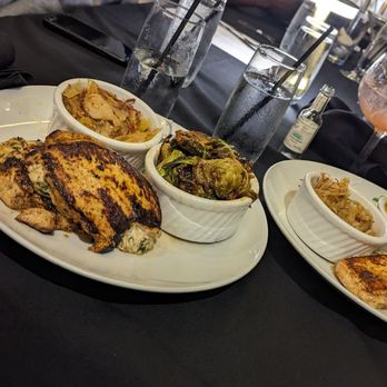 Noir Kitchen & Cocktails - Stuffed Chicken  Cajun cabbage (2) Brussel sprouts  Stuffed Salmon  Smoked Gouda Mac and cheese - Soul Food Near Me - Nashville, Tennessee