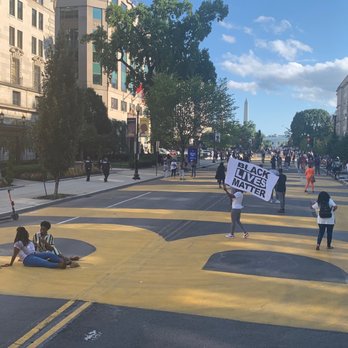 Black Lives Matter Plaza - Nneka and Nneka reflecting on the "B" of BLM mural - Public Art Near Me - Washington, DC, District of Columbia