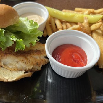 Sea Breeze Cafe - The Blackened Grouper Grab with remolaude sauce and fries. All was excellent! - Cafes Near Me - Sanibel, Florida