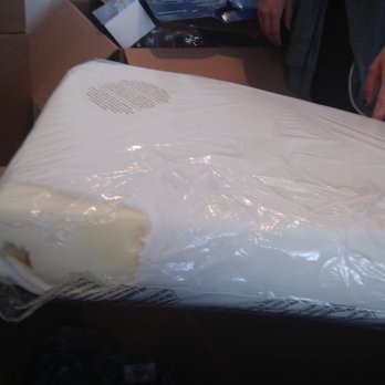 Inside Moves Relocation Services - Medical Neck Brace Pillow still in original packaging, gouged by other items packed with it. - Movers Near Me - Reseda, California