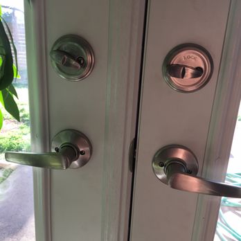 Pella Windows and Doors Showroom of Austin, TX - French doors with two dead bolts make no sense. The left one is non-functional, as is the exterior "lock" attached to it. - Windows Installation Near Me - Austin, Texas Pella Windows and Doors Showroom of Austin, TX - French doors with two dead bolts make no sense. The left one is non-functional, as is the exterior "lock" attached to it. - Windows Installation Near Me - Austin, Texas