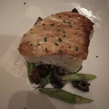 The Capital Grille - Pan-Seared Sea Bass with Shiitake Mushrooms, Asparagus and Miso Butter - Steakhouses Near Me - Austin, Texas