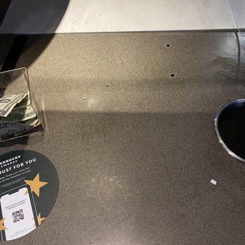 Starbucks - a cup of coffee on a counter - Coffee & Tea Near Me - Framingham, Massachusetts Starbucks - a cup of coffee on a counter - Coffee & Tea Near Me - Framingham, Massachusetts