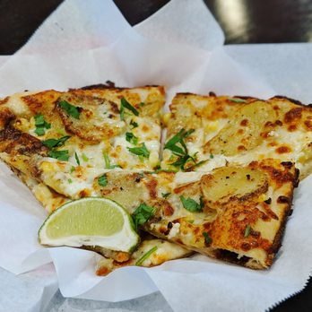 Sliver Pizzeria - Roasted Yukon Gold Potatoes with corn - Pizza Near Me - Berkeley, California Sliver Pizzeria - Roasted Yukon Gold Potatoes with corn - Pizza Near Me - Berkeley, California