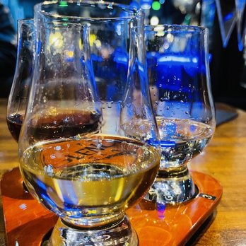 Pilars Martini - three glasses of wine on a tray - Piano Bars Near Me - Winter Garden, Florida