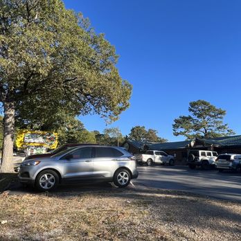 Rowdy Beaver - a silver car parked in a parking lot - New American Near Me - Eureka Springs, Arkansas