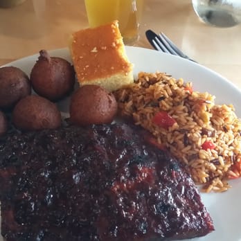 Big T's BBQ & Smokehouse - Two meat platter - St Louis Ribs and Pulled Pork with dirty rice and hush puppies. - Barbeque Near Me - Calgary, Alberta