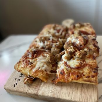 Turquoise Wine Bar - Meat lovers pizza - Wine Bars Near Me - Phoenix, Arizona