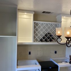 Vintage Electric - New under cabinet puck lights and outlets.