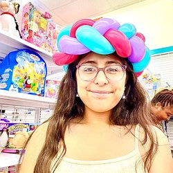 Monkey Business Events & Entertainment - Balloon twisting for grand openings of retail businesses.