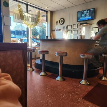 Plaza Restaurant - a person sitting at a bar - Diners Near Me - Boonton, New Jersey Plaza Restaurant - a person sitting at a bar - Diners Near Me - Boonton, New Jersey